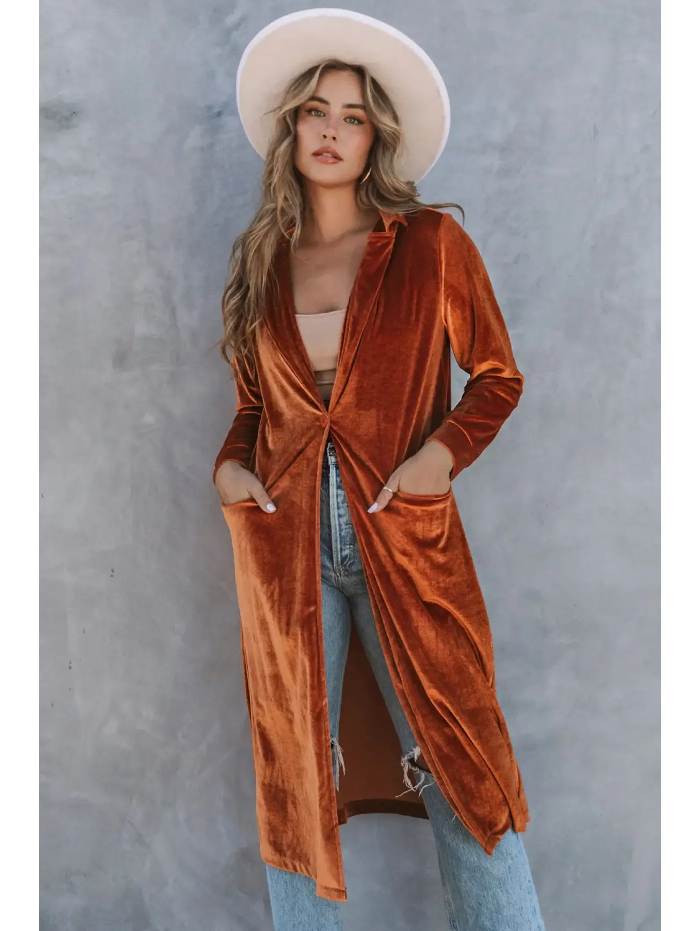 Trendy Women's Coats in warm orange velvet with pockets, ideal for stylish layering in cool weather