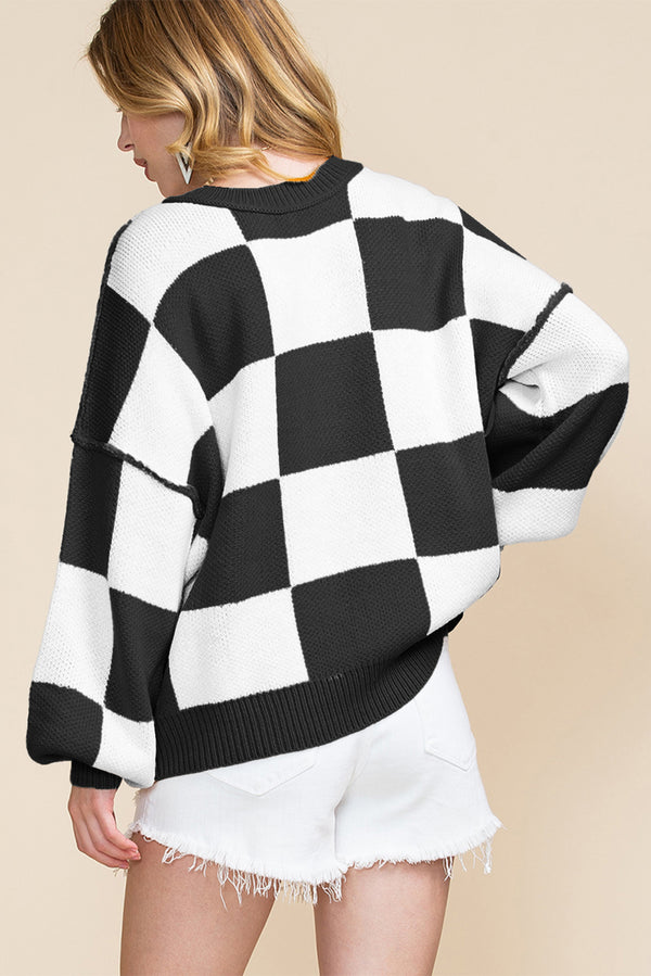 Black checkered sweater UK bishop sleeve detail close-up
