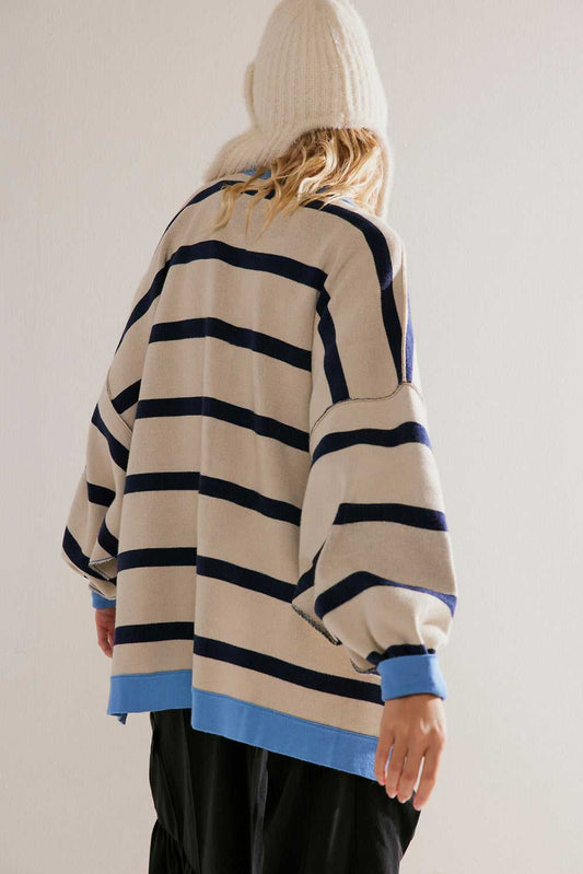 Back view of Urban Stripe Loose Cardigan in beige with navy stripes and blue hem, highlighting its oversized, cozy fall-ready style.