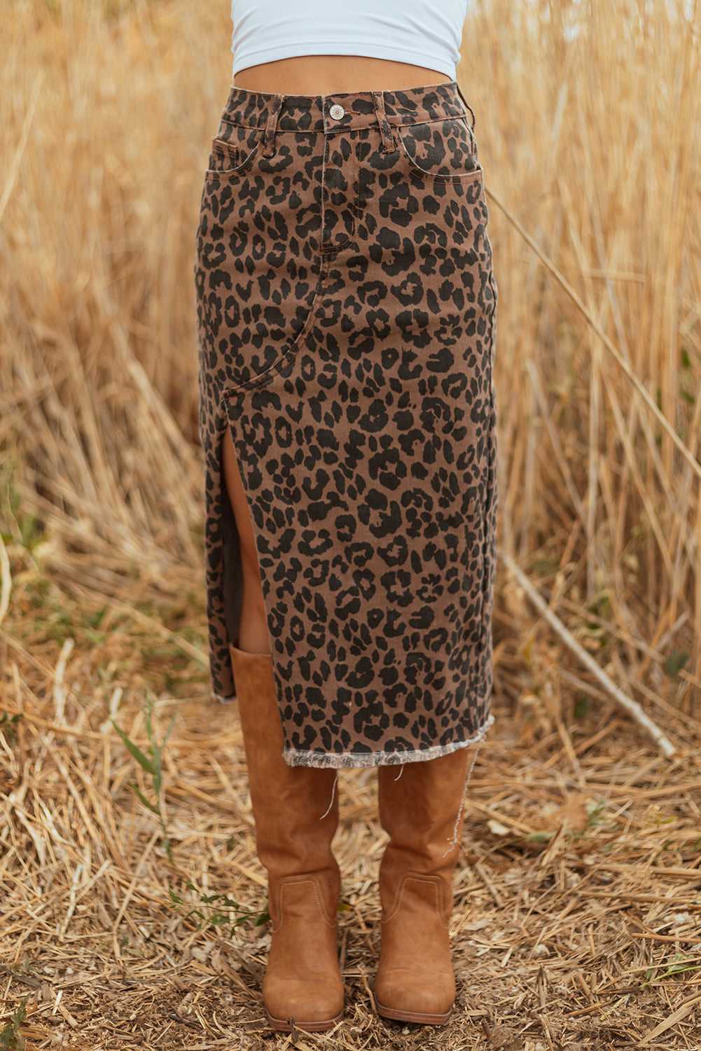 Front view of Leopard Denim Midi Skirt - Summer Fashion by FashionFitz worn with white top and brown boots in outdoor setting.
