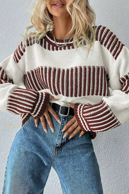Model wearing brown striped jumper with relaxed fit and round neckline