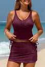 Woman wearing burgundy ribbed crossed detail tank and skort swimsuit set front view Fashionfitz UK