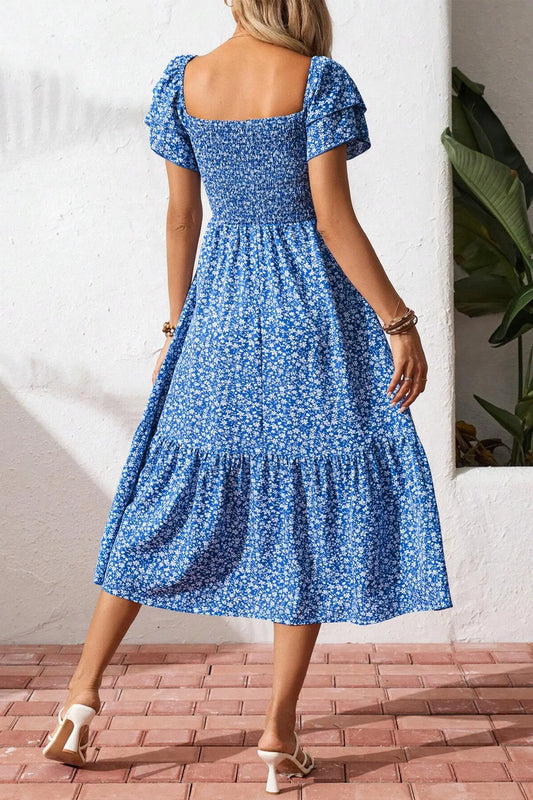 Women's floral smocked midi dress side view summer vacation