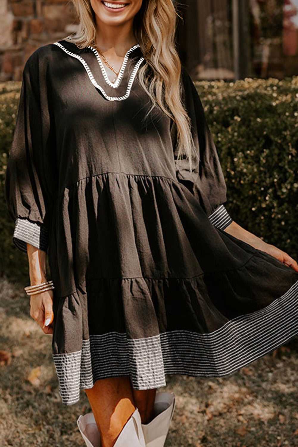 Black Stitch Detail Tiered V‑Neck Babydoll Dress by FashionFitz®, with rick rack trim and flared mini silhouette for casual fall outings.