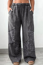 Plus size leopard patchwork mineral wash wide leg trousers front view | Fashionfitz UK