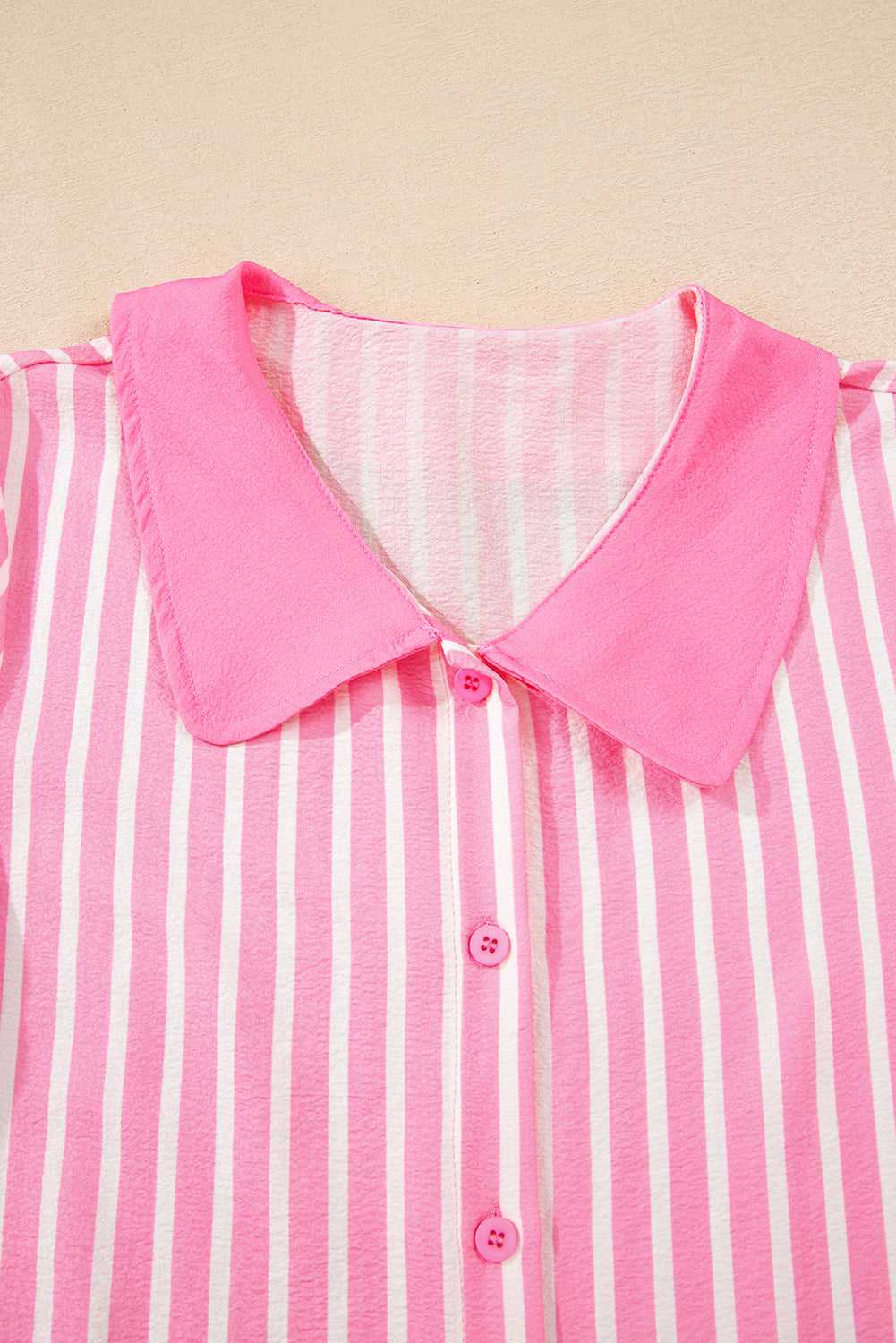 Button and collar detail on pyjama top