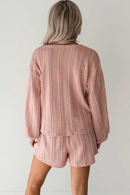 Back view of the Blush Pink Cable Knit Co‑Ord showing textured knit pattern on the cardigan and shorts, perfect for casual daily wear.