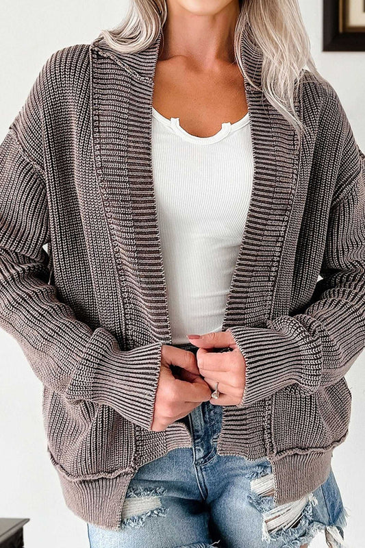Women's stonewash patchwork knit open cardigan in brown, styled with white ribbed tank and distressed denim shorts for a casual fall look.