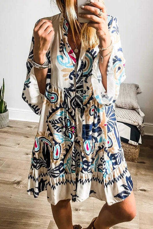 Tribal Mini Dress with bracelet sleeves in bohemian style, featuring a colorful abstract print and buttoned front, ideal for spring outings.