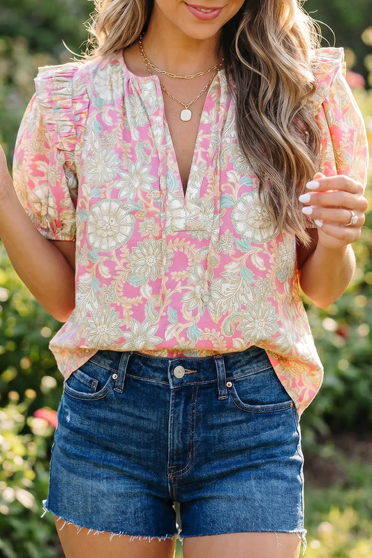 Women's pink floral tie V-neck puff sleeve blouse front view