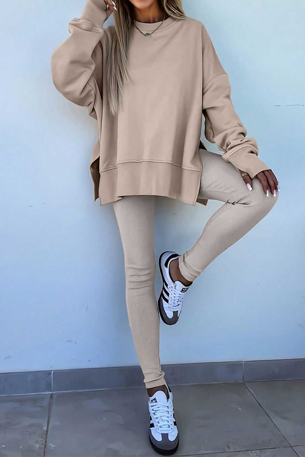 Beige Women's Oversized Sweatshirt and Leggings Matching Set styled with sneakers, perfect for casual fall fashion and comfortable loungewear.