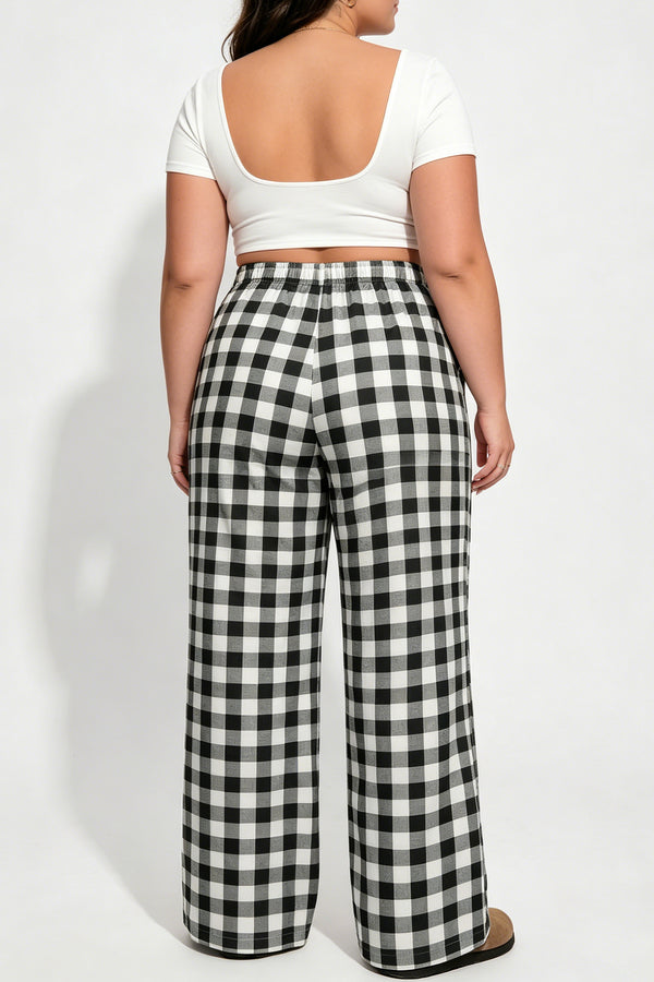 Black plaid plus size trousers — back view showing elastic waist