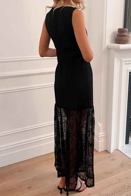 Back view of Black Sleeveless Lace Maxi Dress with sheer lace hem, showcasing its elegant silhouette and summer-ready design.