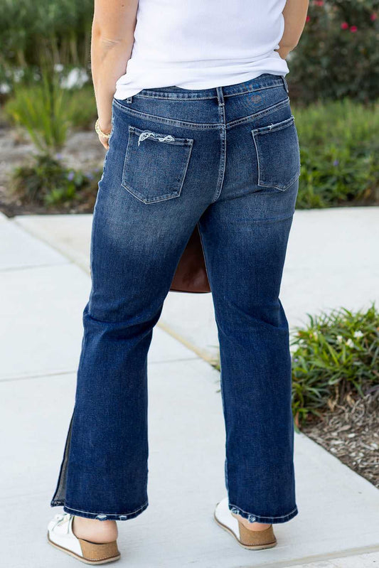 Back view of Dirty Blue Side‑Slit Flare Jeans – Curve showing high waist and rear pockets in plus size denim for casual fall fashion.