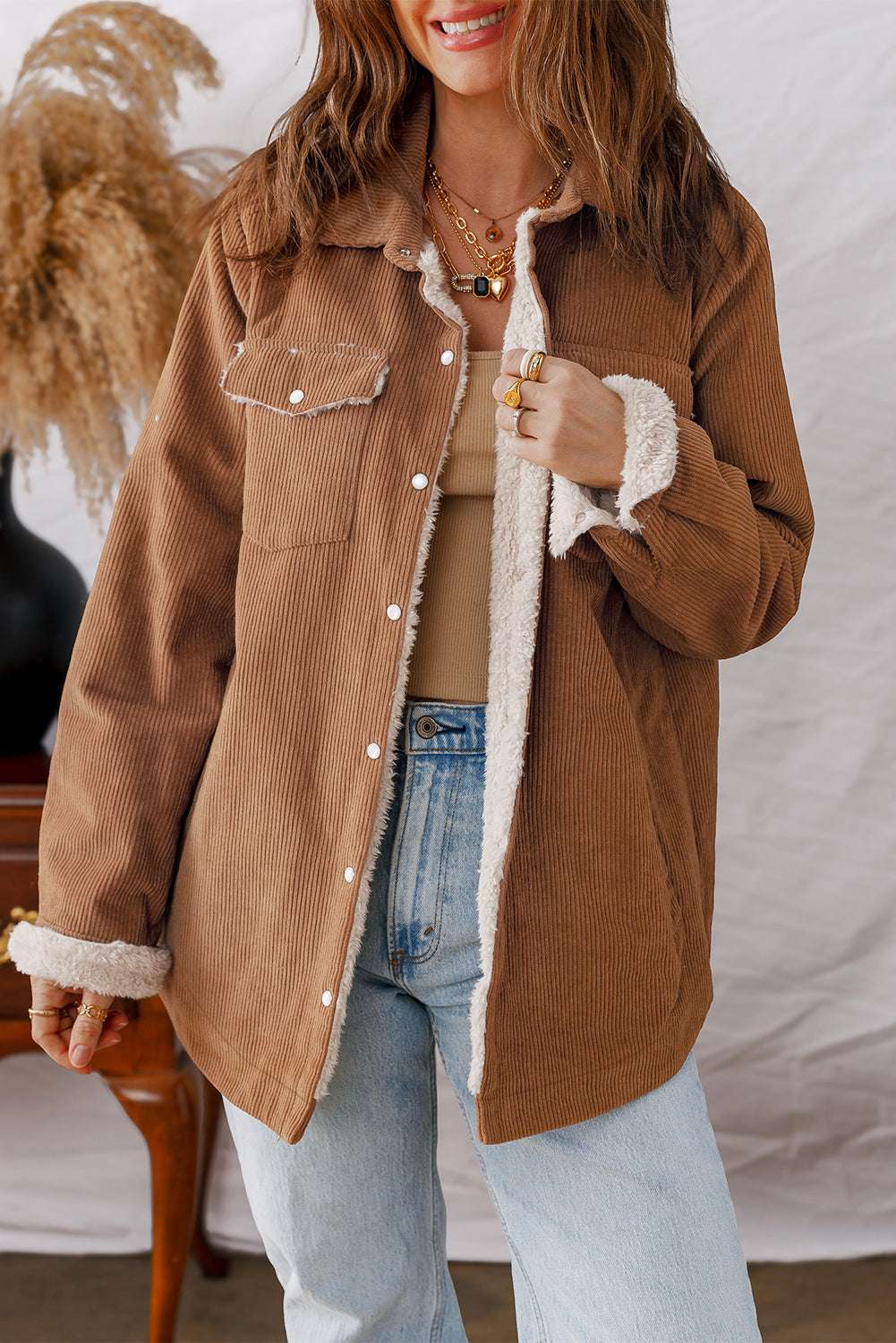 Front view of Fleece Lined Corduroy Jacket in versatile brown, featuring snap buttons and tailored casual fit.
