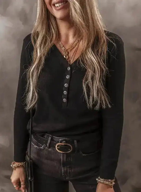 Black Ribbed V‑Neck Long Sleeve Top styled with dark jeans and layered gold jewelry, perfect for casual fall layering.