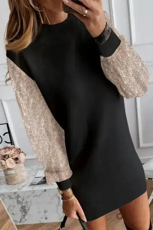 Black shift mini dress with rose gold sequin balloon sleeves, ideal for winter partywear and elegant evening occasions.