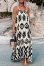White Aztec Print Western Sundress with black tribal patterns, styled with sandals and a straw hat for summer streetwear.