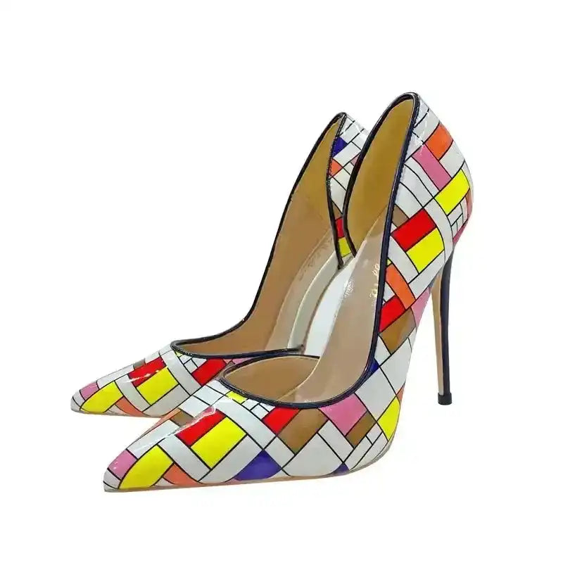 Close-up of Prism Clash Chequered Court Heels in vibrant colors, featuring sleek stiletto heel and modern geometric design.