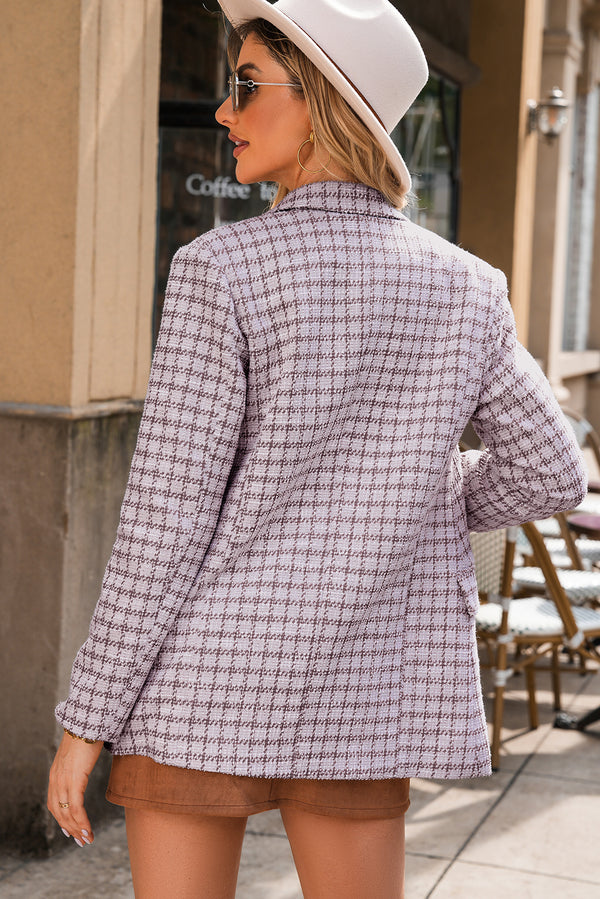 Back view of elegant tweed plaid blazer showing structured tailoring