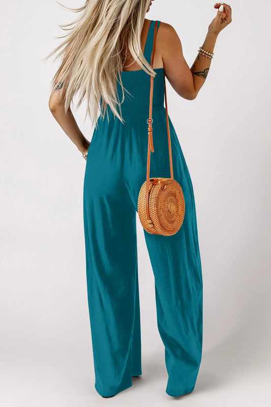 Peacock blue smocked square neck sleeveless jumpsuit with pockets