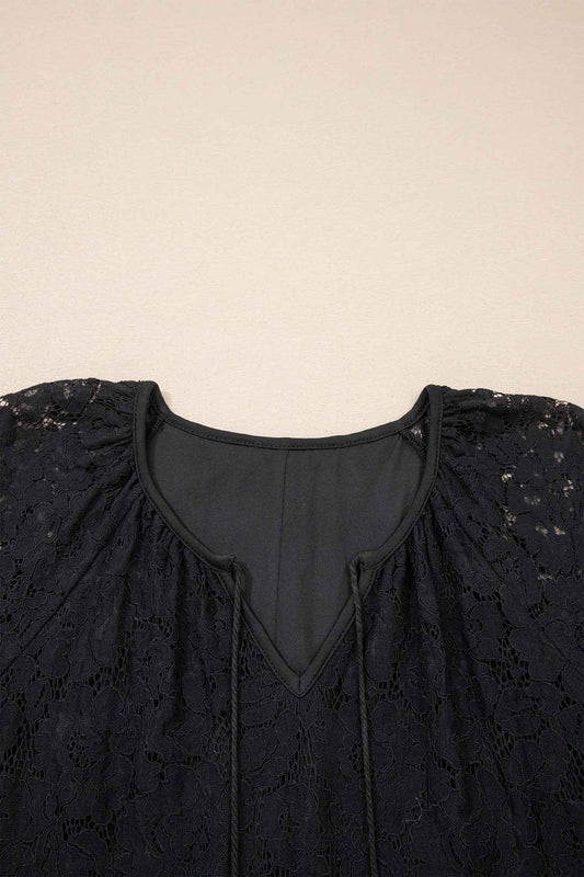Close-up of the neckline on the Black Lace Maxi Dress with tassel ties and soft inner lining, highlighting its Southern Belle summer style.