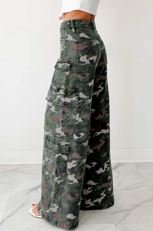 Side view of green camo cargo jeans featuring wide leg silhouette and multiple utility pockets. Stylish high-rise denim for women.