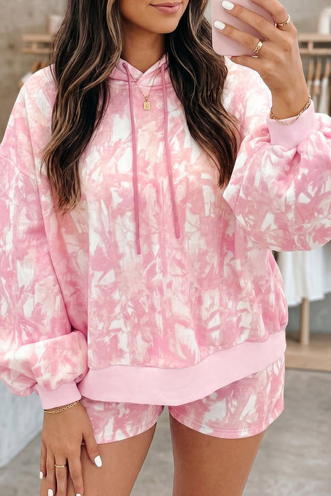 Abstract print hoodie and slim shorts set in pink — front view of full matching co-ord