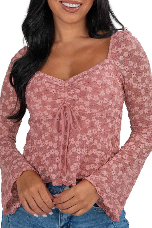 Pink floral lace blouse for women with bell sleeves and square neckline. Romantic top ideal for spring dates and Valentine's Day outfits.