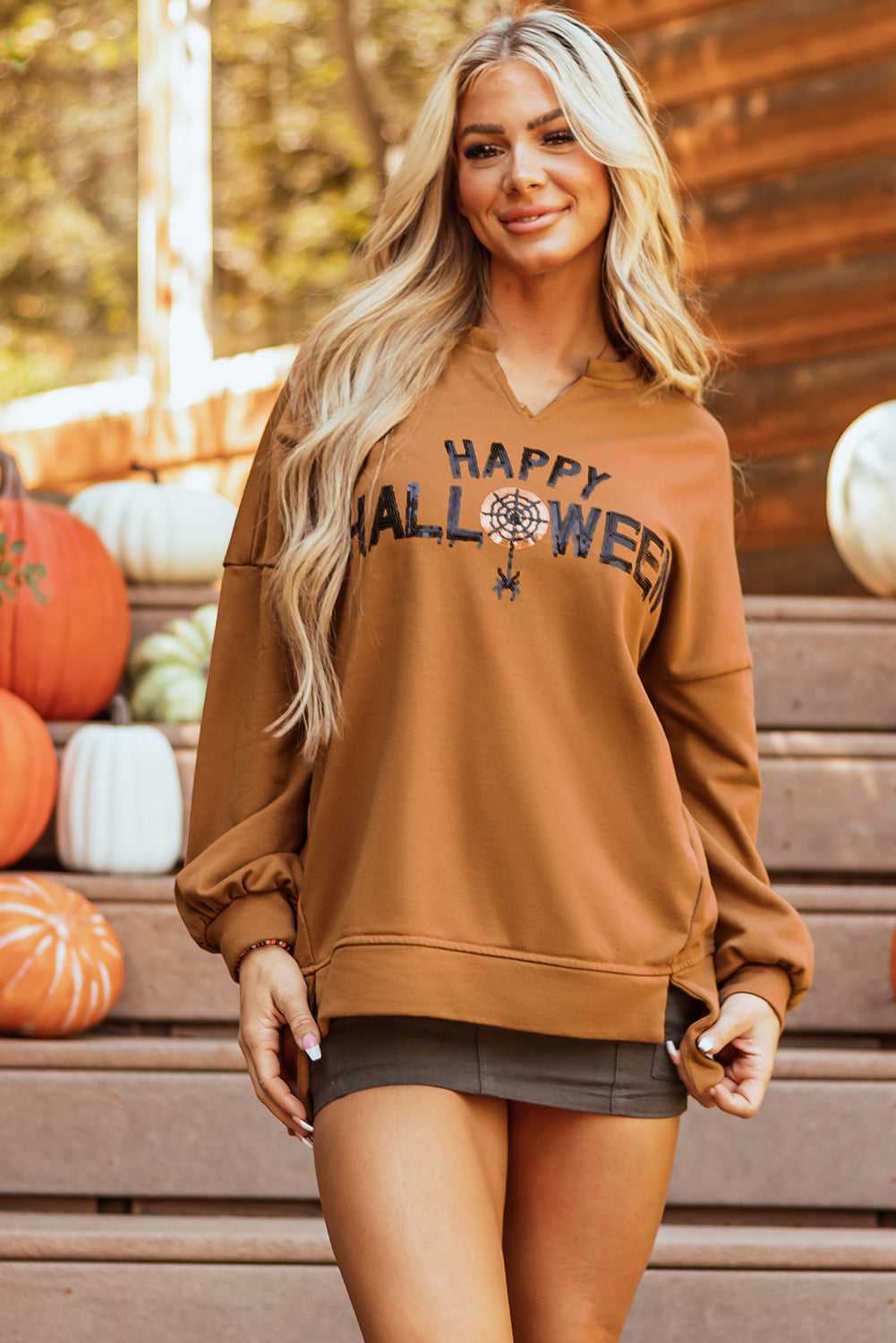 Chestnut Sequin Halloween Top with 'Happy Halloween' graphic and spider web detail, V-neck long sleeve tee for fall parties and casual wear.