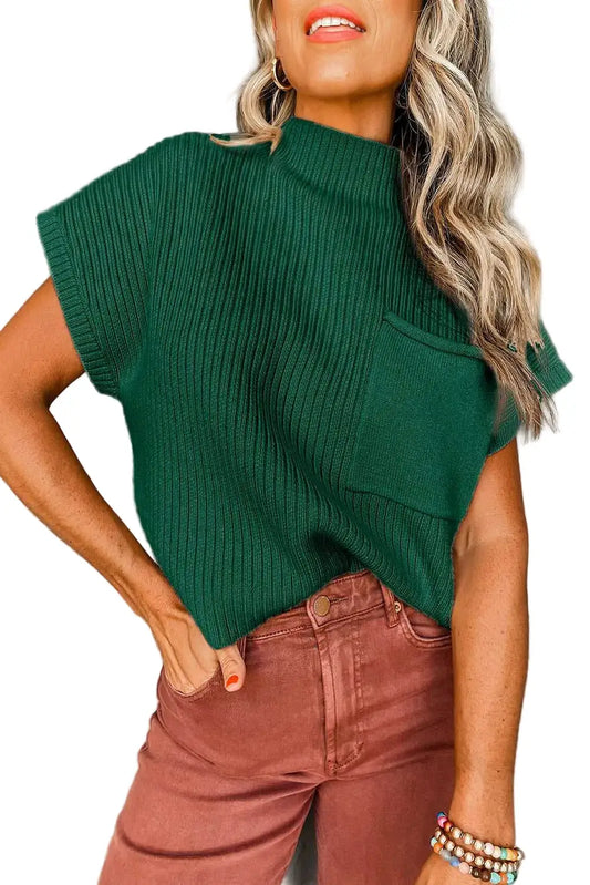 Ribbed Knit Short Sleeve Sweater in green with chest pocket, styled with high-waisted rust pants for a casual chic look.