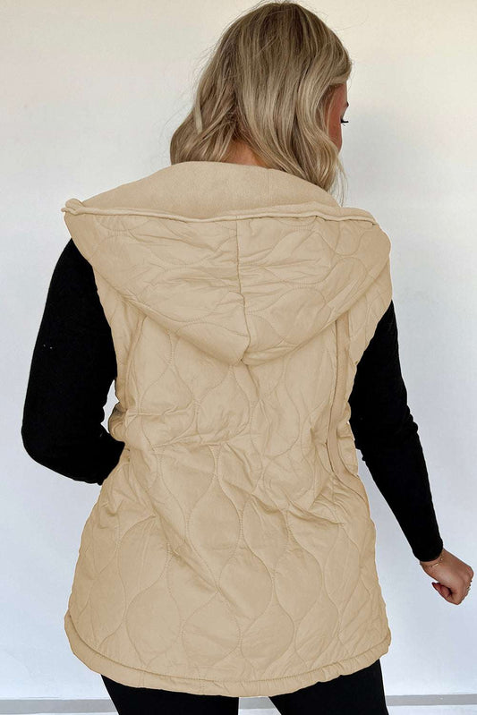 Back view of khaki Quilted Fleece‑Lined Winter Gilet showing hood and quilted pattern, worn over a black long-sleeve top.