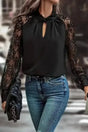 Black Lace Sleeve V-Neck Blouse Women UK — front view showing intricate lace sleeves against solid black body — Fashionfitz