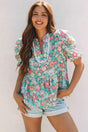 Green Floral Puff Sleeve Blouse Women UK — front view showing vibrant green floral print and structured puff sleeves — Fashionfitz