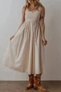 Beige sleeveless ribbed bodice pleated pocketed midi dress front view — Fashionfitz UK