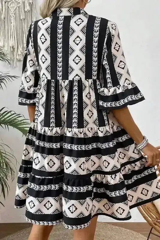 Geometric Aztec ruffle sleeve mini dress back view — Fashionfitz UK