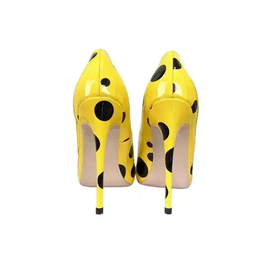 Back view of Polka Dot Yellow Stiletto High Heels Shoes showing slim high heels and bold black polka dots. Stylish pumps for statement outfits.