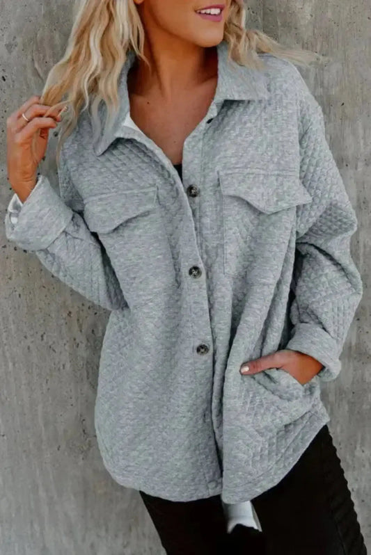 Woman wearing grey lattice textured retro shacket with flap pockets and button front Fashionfitz UK