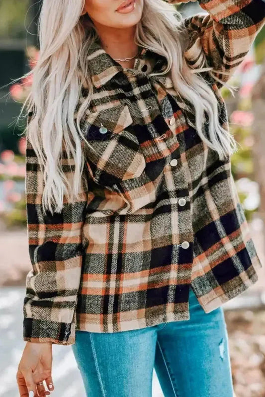 Woman wearing orange oversized plaid shacket with button front in relaxed layering silhouette Fashionfitz UK