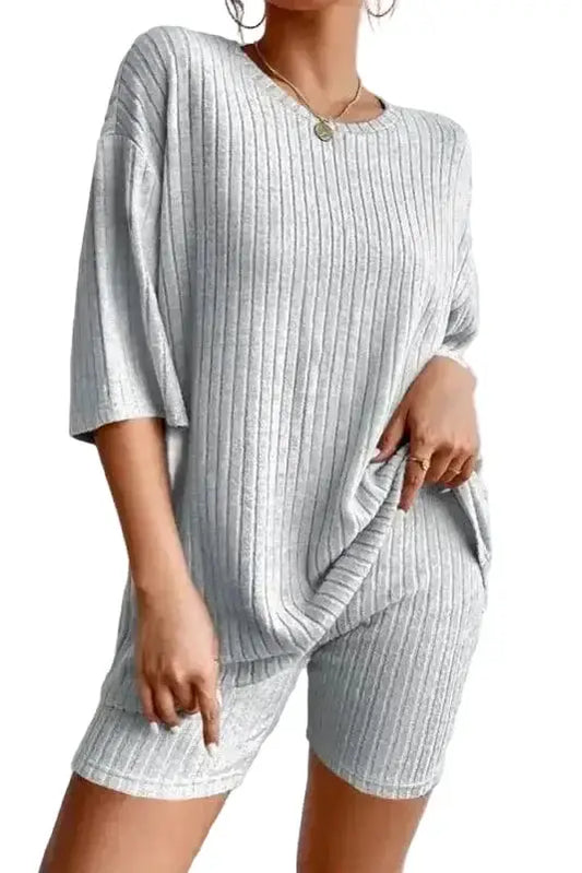 Woman wearing gray ribbed lounge set with matching top and shorts front view Fashionfitz UK