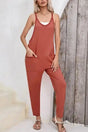 Brown strappy loose harem jumpsuit women UK — front view showing spaghetti straps and relaxed harem silhouette — Fashionfitz