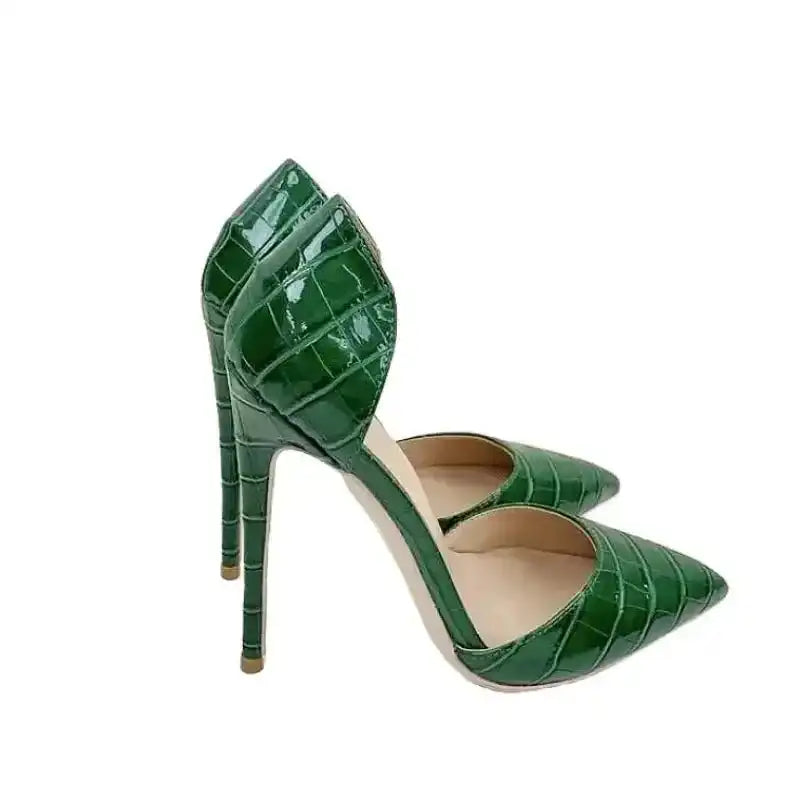 Croc-effect green stilettos with pointed toe and high heel design, perfect for elegant evening wear or special occasions in the UK.