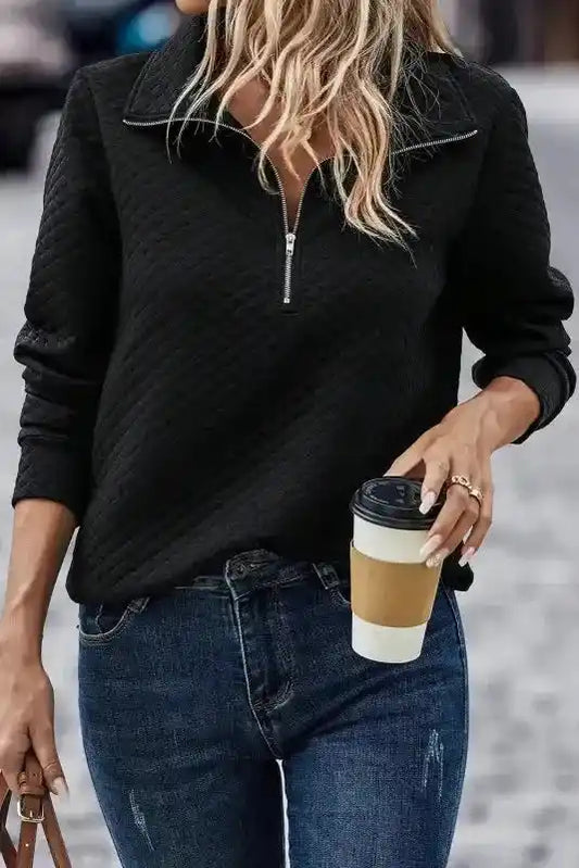 Half Zipper Quilted Sweatshirt - Women's Sweatshirts FashionFitz in black, styled with blue jeans and coffee cup, ideal for casual wear.