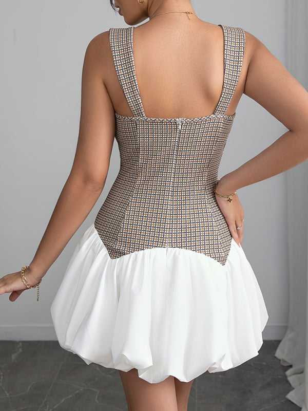 Back view of Houndstooth Slim Bubble Dress – Sleeveless Chic by FashionFitz, showcasing zip closure and structured plaid bodice with white bubble skirt.