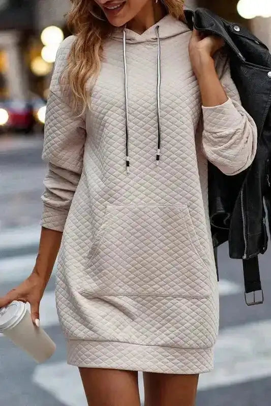 Quilted Hooded Dress - Kangaroo Pocket in beige with long sleeves and front pocket, styled for casual streetwear comfort.