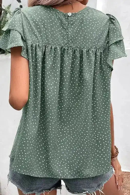 Back view of Polka Dot Ruffle Sleeve Ruched Blouse in laurel green showing shift silhouette — Fashionfitz