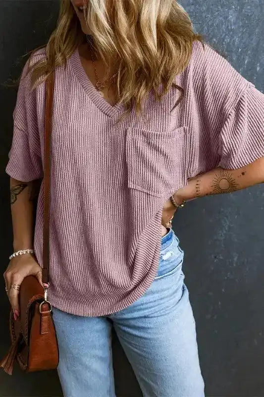 Casual Lavender Corded Loose T‑shirt paired with jeans and a crossbody bag. Soft ribbed fabric and V-neck design for everyday comfort.