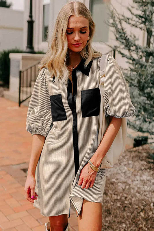 Modern casual mini dress featuring monochrome stripes, puff sleeves, and black accents, ideal for weekend and warm-weather outfits.