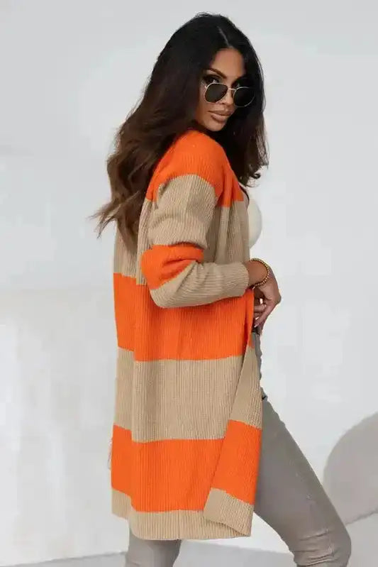 Side view of orange cardigan - colorblock knit design with ribbed texture, perfect for layering in fall and winter fashion.