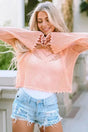 Woman wearing pink eyelet crochet bell sleeve sweater front view Fashionfitz UK